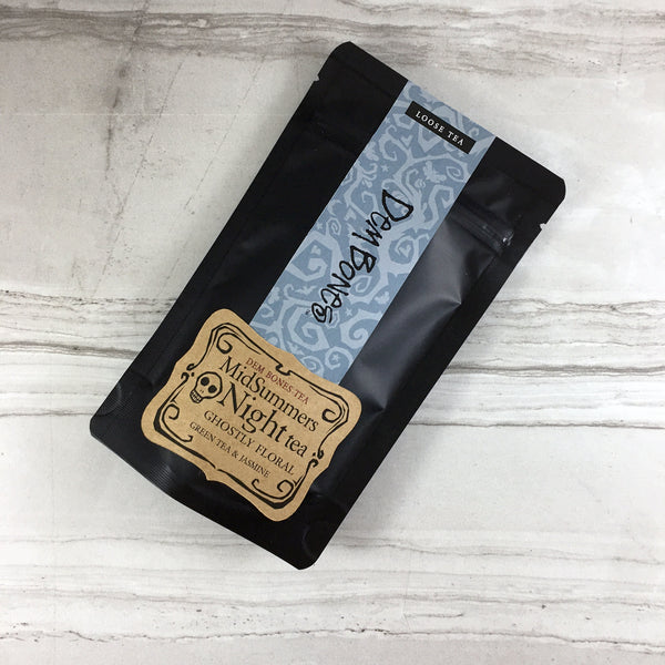 Black Tea bag on light tile, Grey gothic vine graphics with kraft label, DemBones, Loose Tea, MidSummers Night Tea, Ghostly Floral , Green Tea and Jasmine