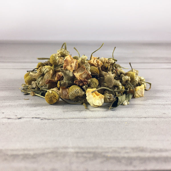 Close up of DemBones sleepy hallow herbal tea on white marble background close up of tea